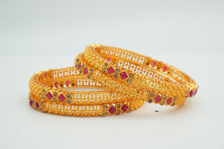 Stylish Gold Bangle Adorned with Pink Gemstones - Victorian Jaipur