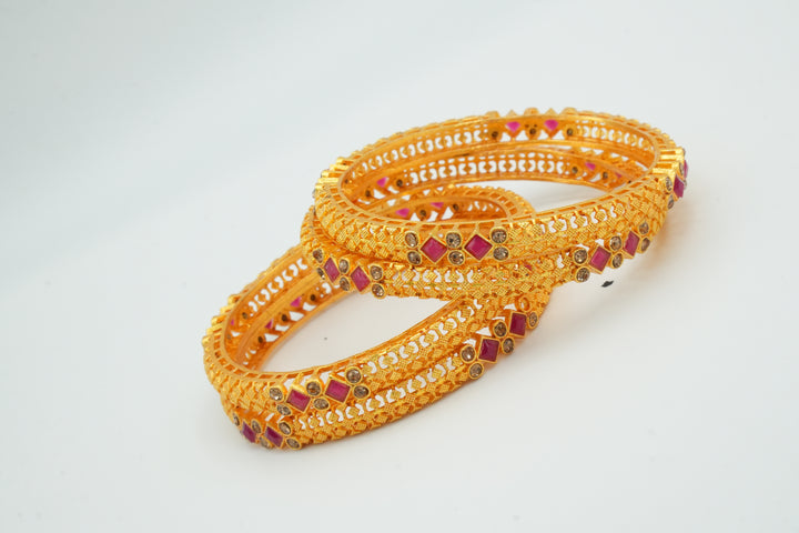Stylish Gold Bangle Adorned with Pink Gemstones - Victorian Jaipur