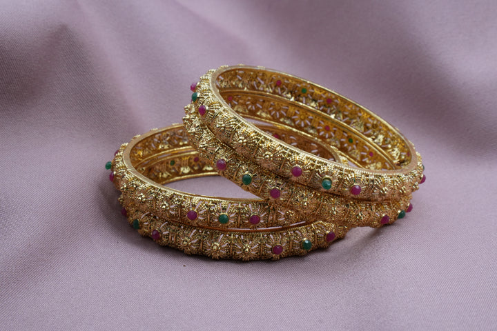 Elegant Gold-Plated Bangles Adorned with Pink & Green Accents - Victorian Jaipur