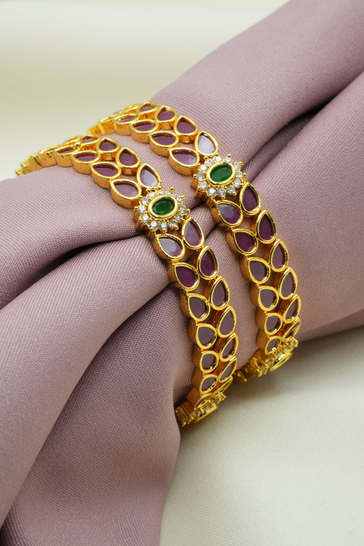 Royal Gold-Plated Bangles Adorned with Pink and Green Gems - Victorian Jaipur