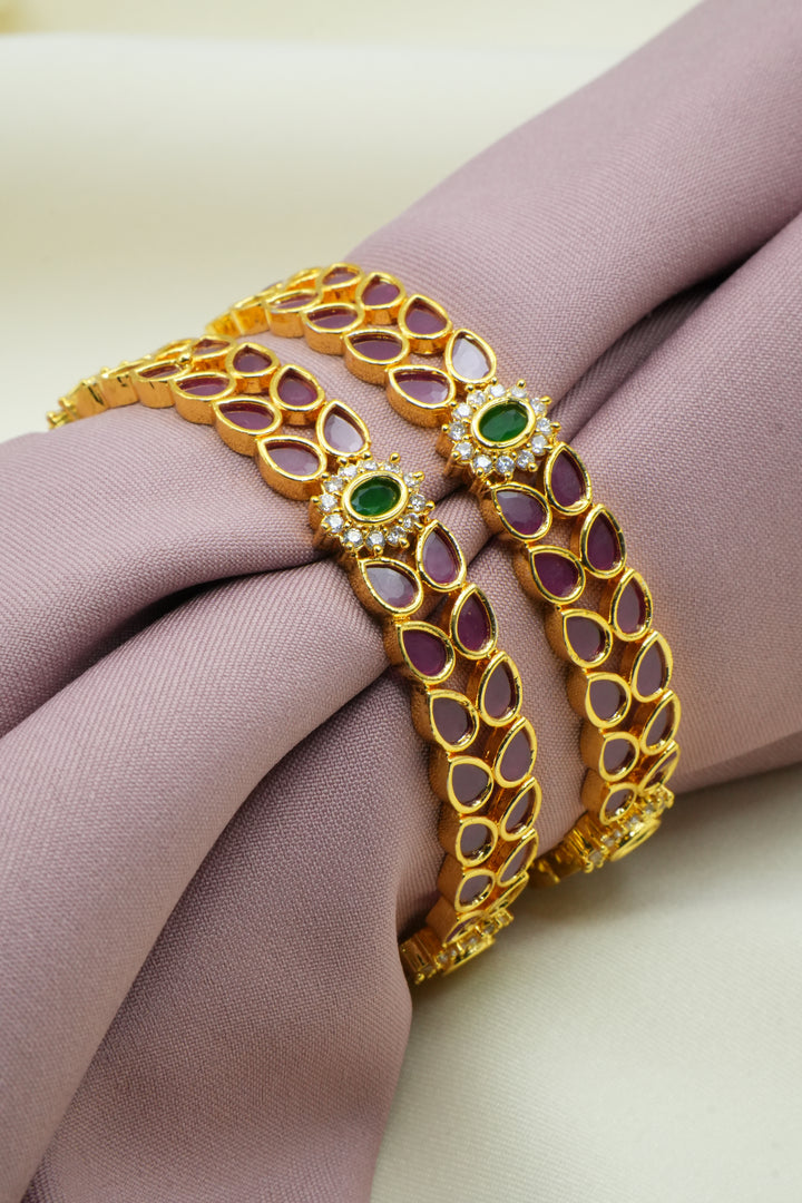 Royal Gold-Plated Bangles Adorned with Pink and Green Gems - Victorian Jaipur
