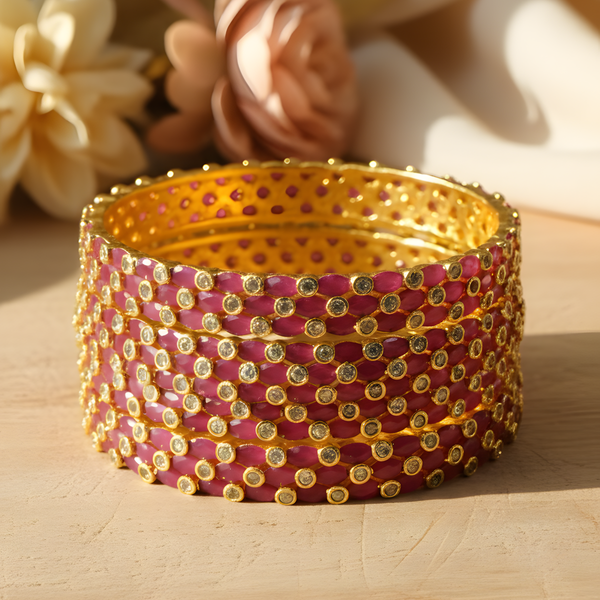 Charming Gold Plated Bangle with Pink Accents